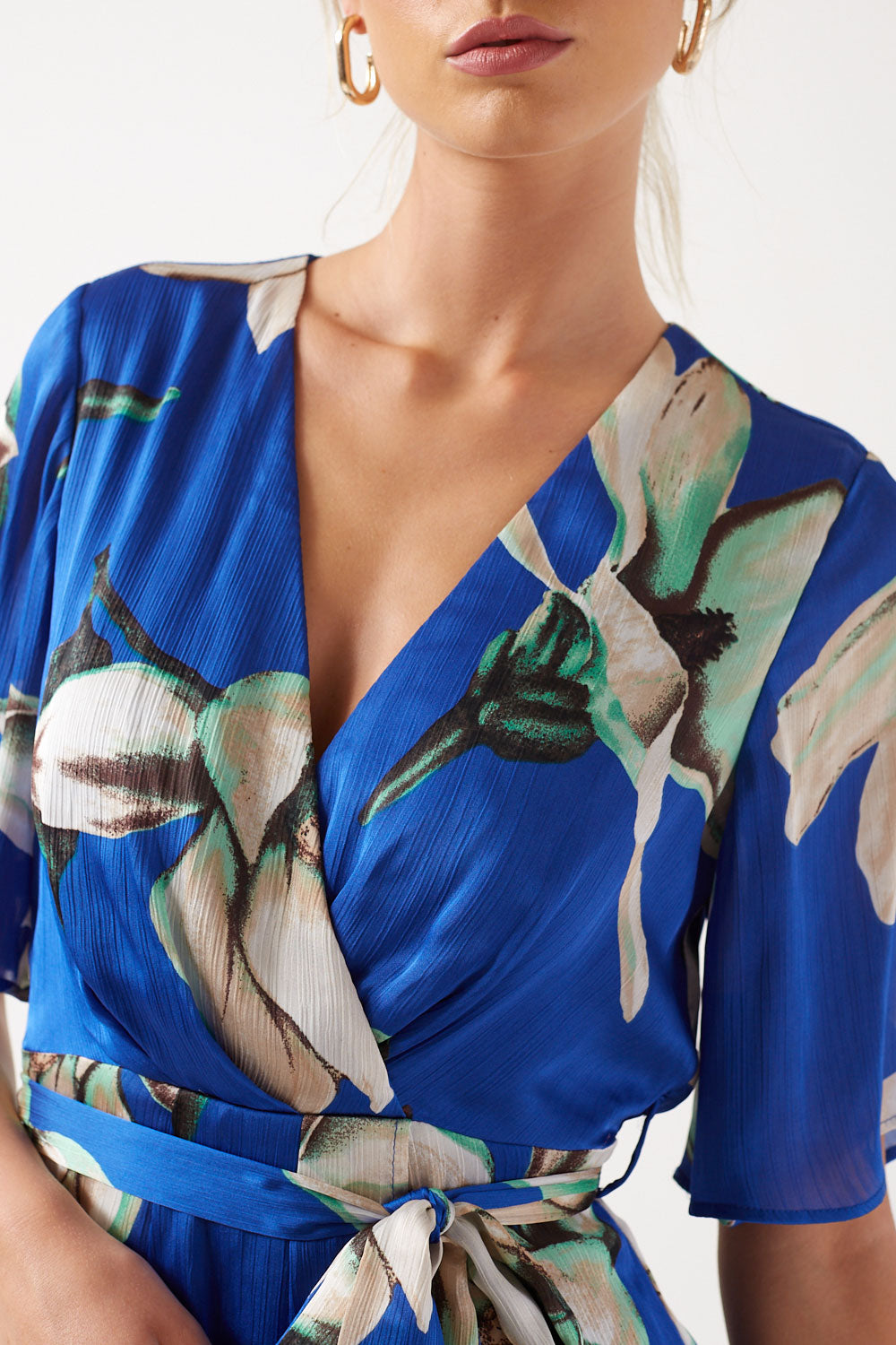 Wendy Floral Wrap High-Low Midi Dress in Blue