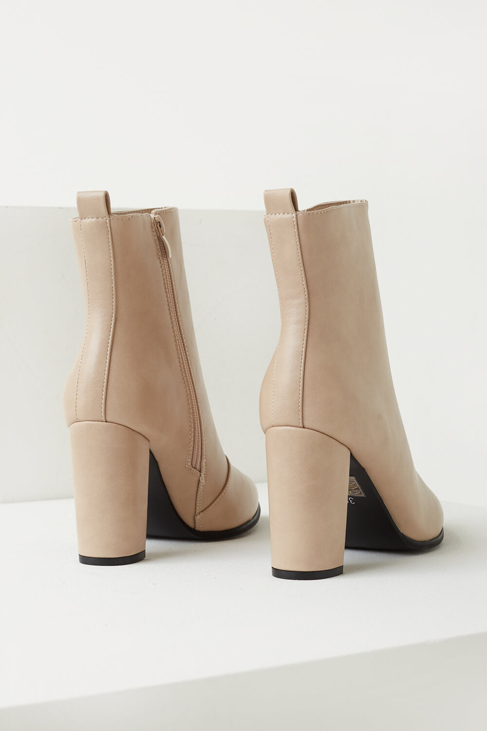Blair Faux Leather Heeled Ankle Boots in Beige
