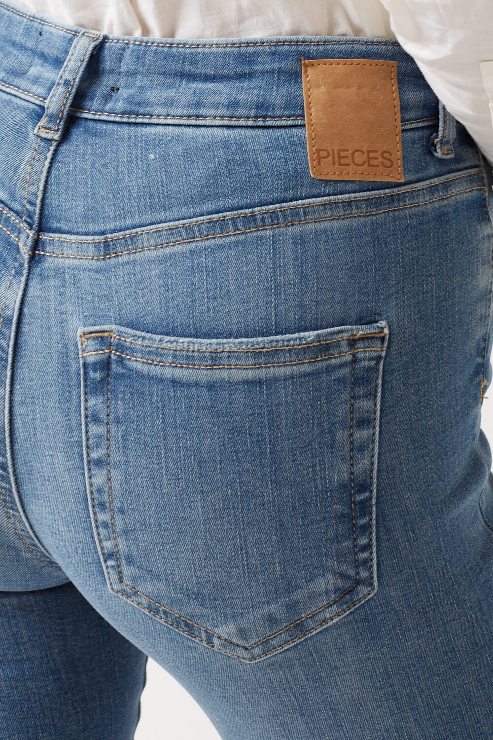 Delly Mid Rise Light Wash Skinny Jeans