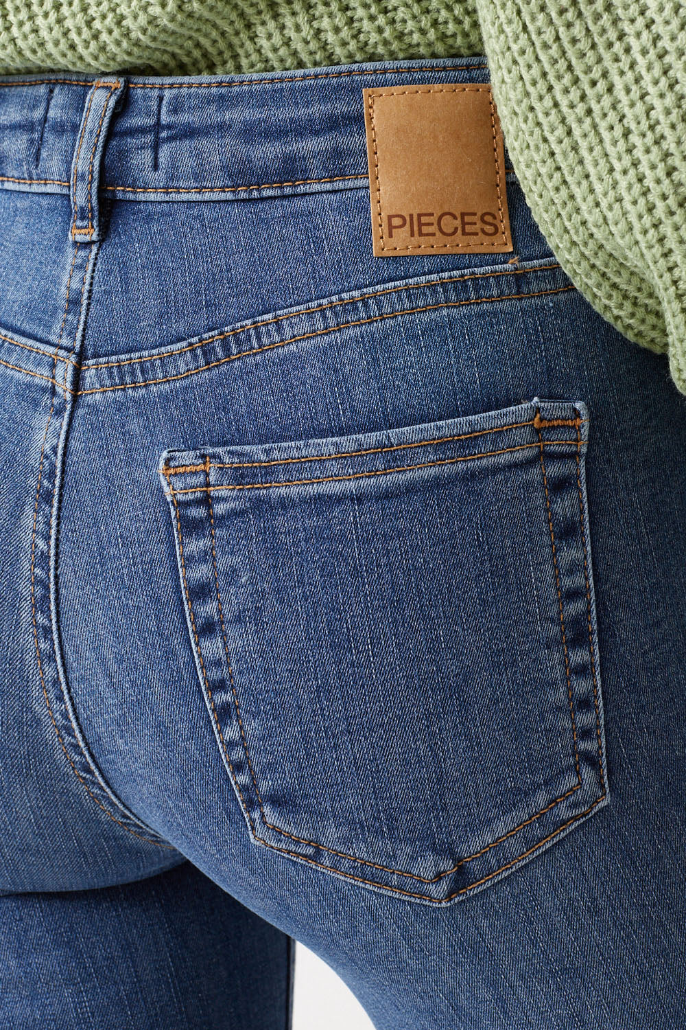 Delly Mid Rise Skinny Jeans in Medium Blue