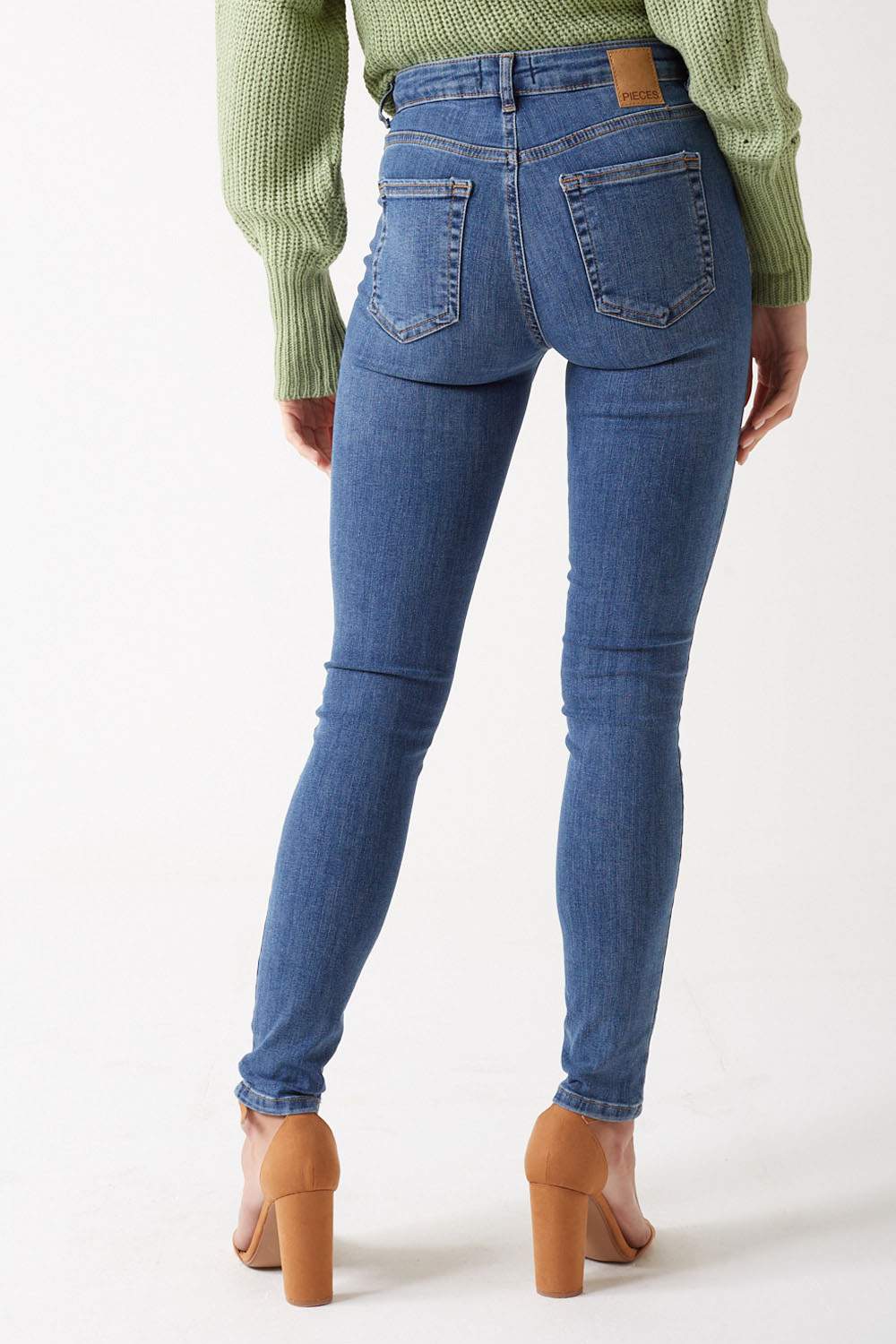 Delly Mid Rise Skinny Jeans in Medium Blue
