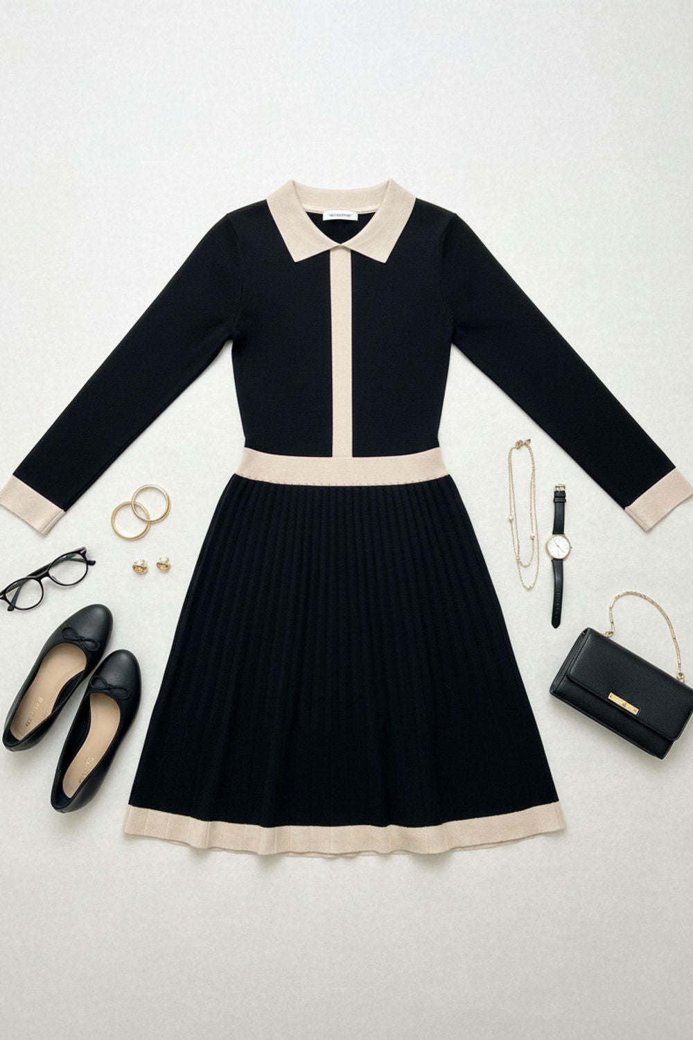 Border Print Pleated Knit Knee Length Dress in Black and Cream