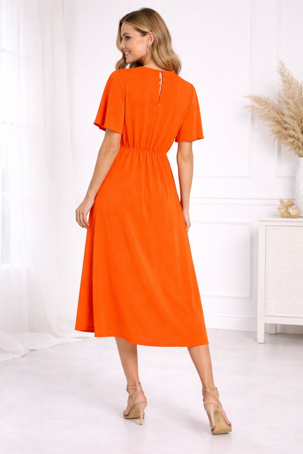 Short Flutter Sleeve Wrap-Style Midi Dress in Orange