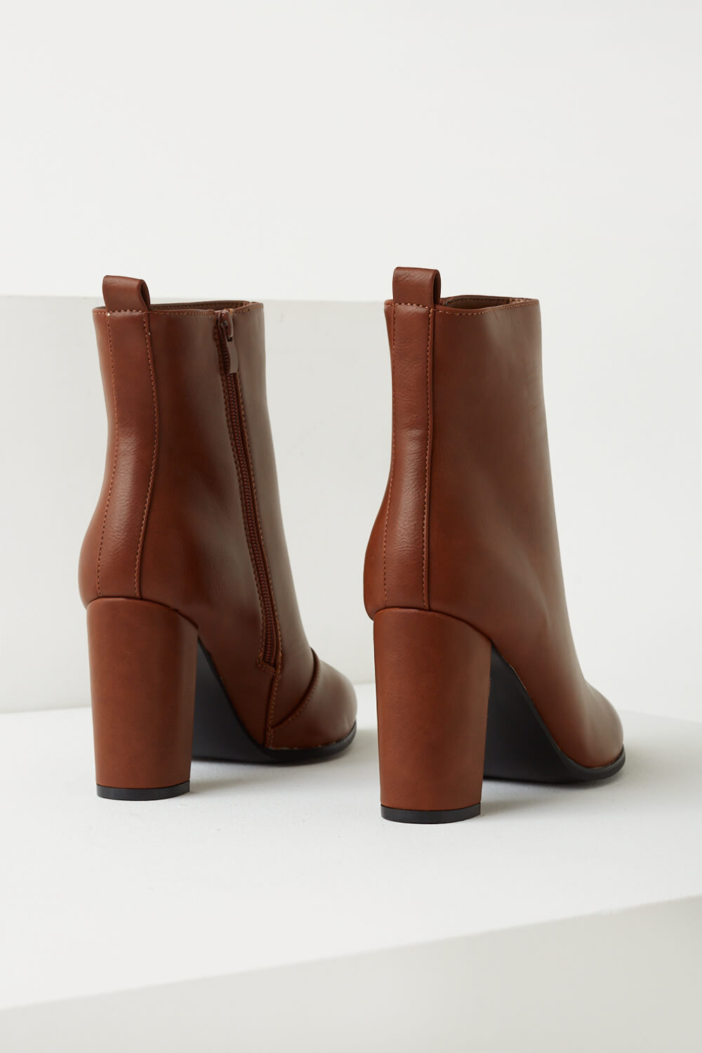 https://www.iclothing.com/media/catalog/product/b/l/blair_faux_leather_heeled_ankle_boots_in_camel-3.jpg