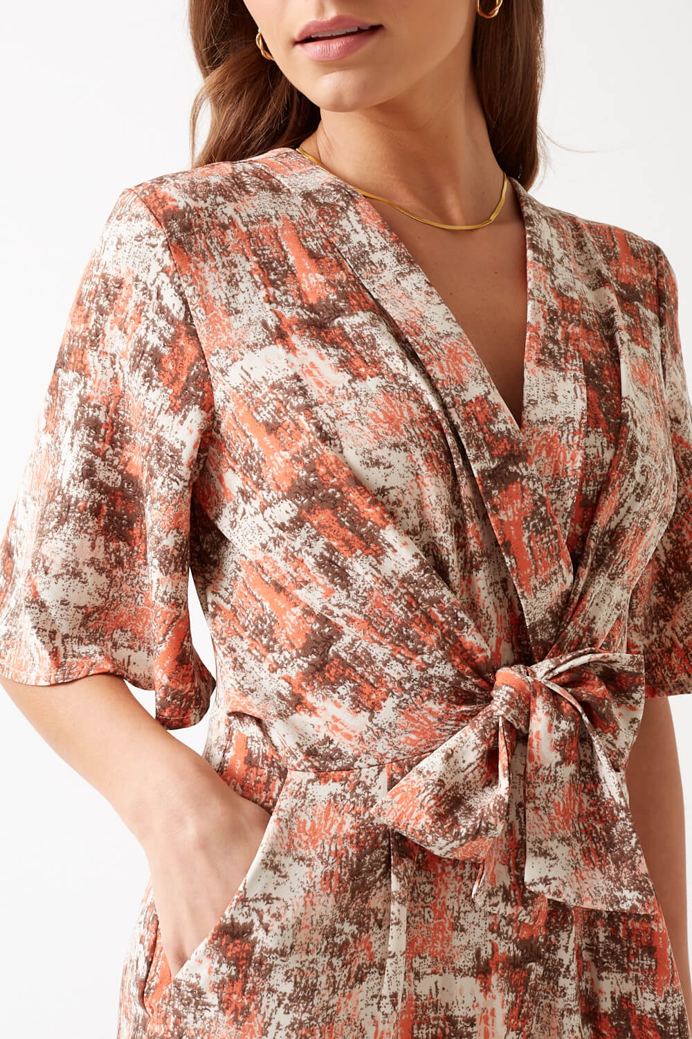 https://www.iclothing.com/media/catalog/product/k/a/kanika_printed_short_sleeve_jumpsuit_in_peach-1.jpg