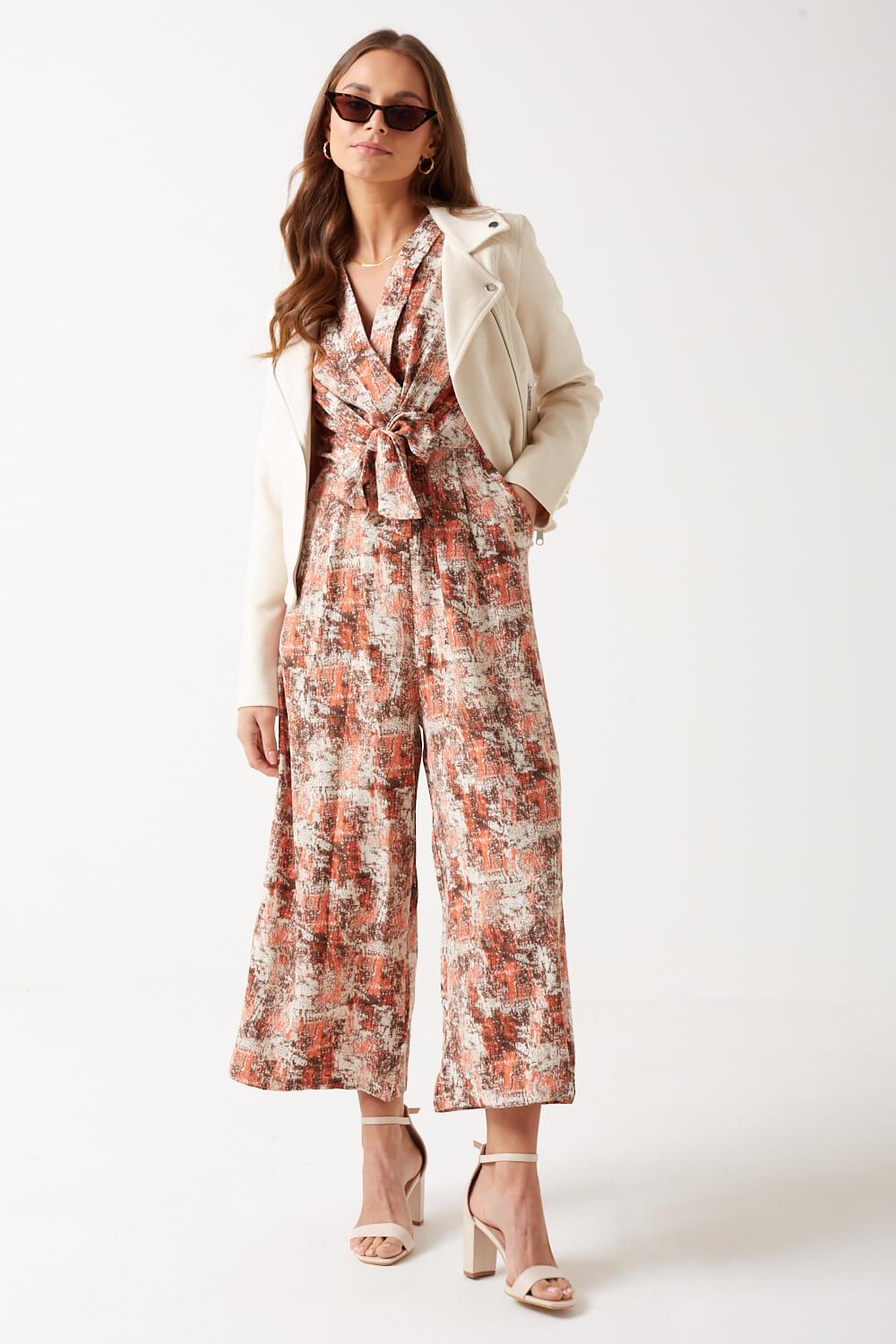 https://www.iclothing.com/media/catalog/product/k/a/kanika_printed_short_sleeve_jumpsuit_in_peach-4.jpg