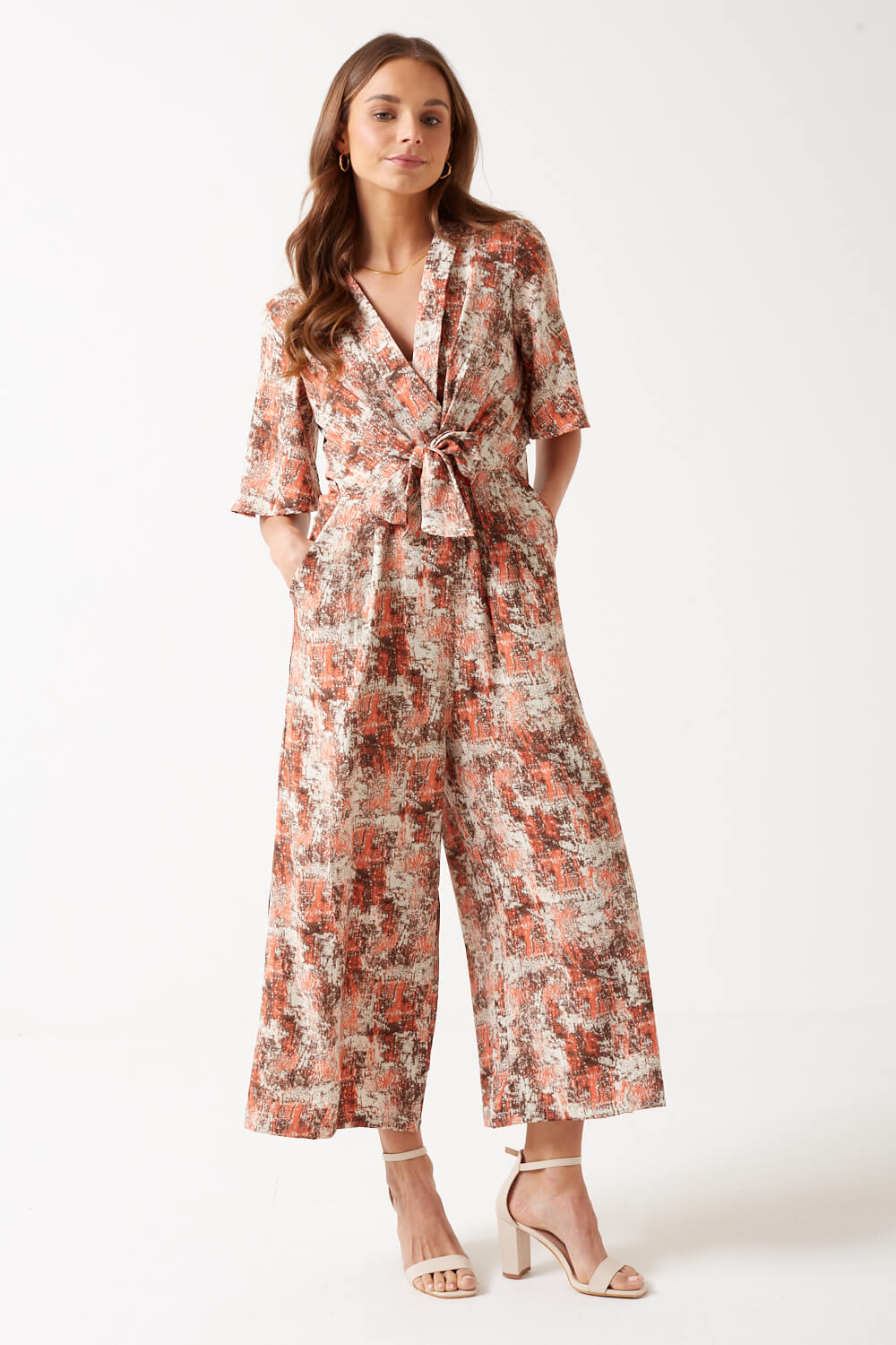 https://www.iclothing.com/media/catalog/product/k/a/kanika_printed_short_sleeve_jumpsuit_in_peach-5.jpg