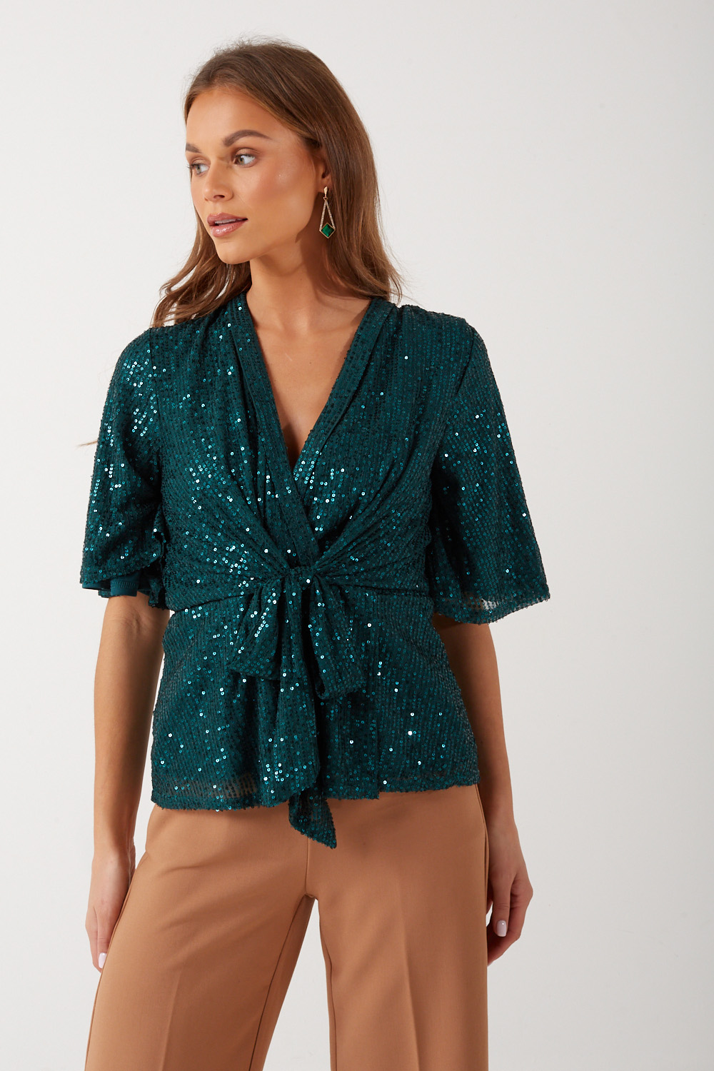 https://www.iclothing.com/media/catalog/product/t/a/tara_sequin_wrap_top_in_green-1_1.jpg